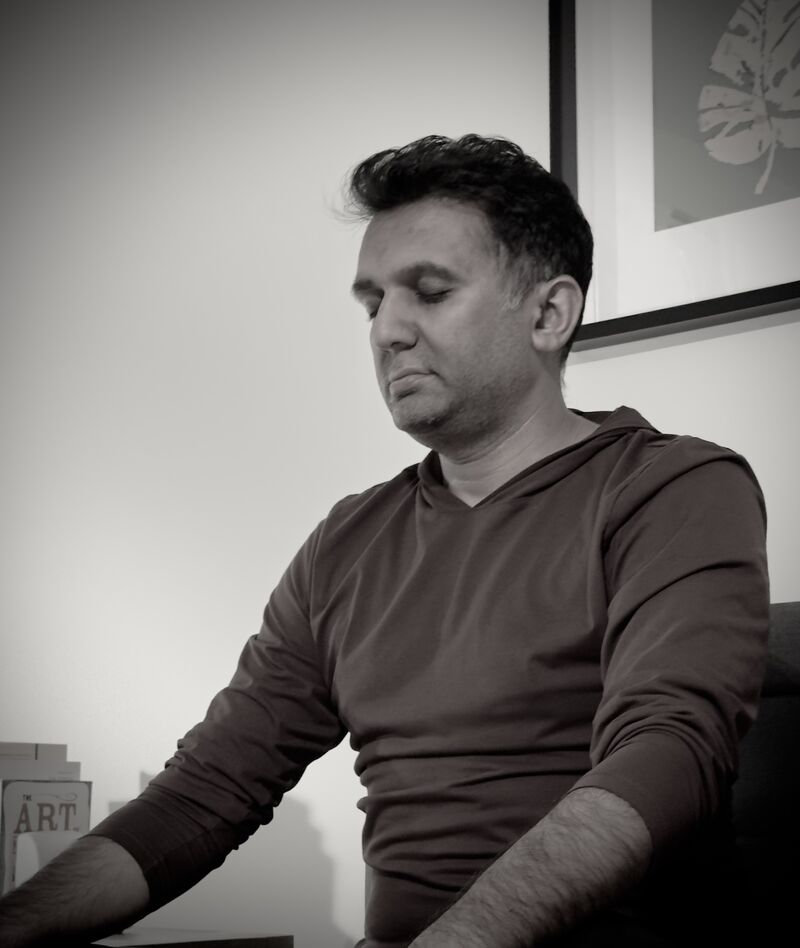 Ashwin meditating, black and white portrait